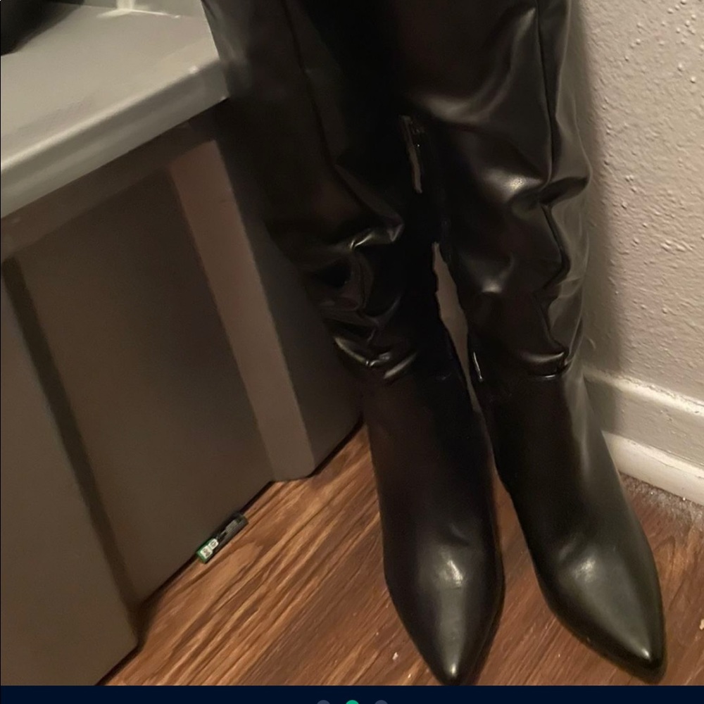 Black heeled booths thigh high only used once they are to small for me